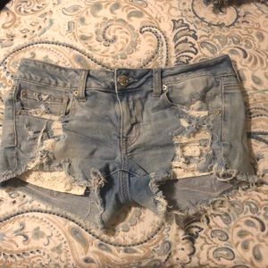 Light wash jean shorts.